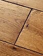 Brushed medium brown oak floor close up