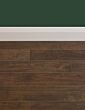 walnut flooring with green wall