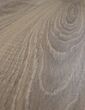 Embossed grey-brown laminate flooring