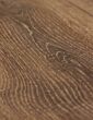 Oak wood grain on brown laminate flooring